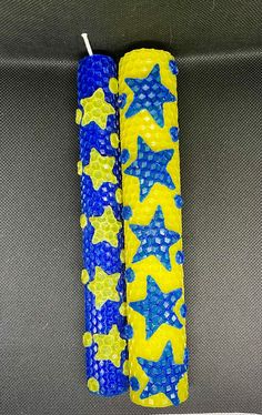 two blue and yellow stars are on the seat