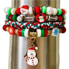 These Festive Christmas Bracelets Add Holiday Cheer With Every Jingle. Perfect For The Person Whose Spirit Animal Is A Snowman Or Santa. Enjoy The Stretchy Comfort And Just Be Careful Not To Frighten The Cat With All The Charm Dangling. Christmas Themed Stackable Bracelets, Set Of 4 Size: Os, Bracelets Have A Circumference Of Approximately 6.8 Inches When Unstretched. Condition: New Set Of 4 Bracelets Christmas-Themed Beads Snowman And Santa Charms Stretchy Elastic Fit Multicolor Design: Red, Wh Red Christmas Bracelets For The Holidays, Red Christmas Bracelets For Holiday, Red Christmas Bracelet For Holiday, Red Christmas Holiday Bracelet, Multicolor Beaded Bracelets For Christmas, Colorful Beads Bracelets For Christmas Holiday, Colorful Beaded Bracelets For Christmas Holiday, Colorful Beads Bracelets For Christmas, Adjustable Colorful Beaded Bracelets For Christmas