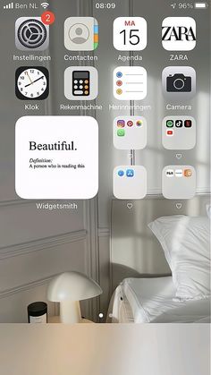 an image of a bed with many different app icons on the wall above it,