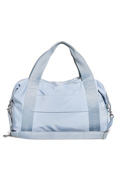 This lightweight duffle with webbed top handles and an optional shoulder strap is the perfect carryall for travel or the gym. A trio of exterior zip pockets keeps essentials organized, while a wide strap ensures it slips over your luggage with ease. Two-way top zip closure Top carry handles; adjustable removable shoulder strap Exterior zip pockets; slip pocket with magnetic snap closure Interior zip and slip pockets Slip-through luggage strap Water-resistant Lined Recycled polyester/polyester Im Blue Duffle Bag With Zipper Closure For On-the-go, Sporty Duffle Bag With Removable Pouch, Sporty Tote Travel Bag With Zipper Closure, Sporty Blue Nylon Travel Bag, Blue Nylon Sporty Travel Bag, Sporty Blue Duffle Bag For Everyday, Sporty Satchel Gym Bag, Sporty Blue Gym Bag For Everyday, Blue Nylon Duffle Bag