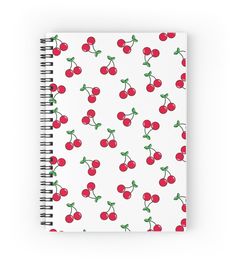 a spiral notebook with cherries on it