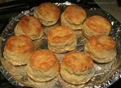 a bunch of biscuits sitting on top of tin foil