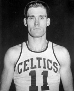 an autographed photo of a basketball player with his jersey number 11 on it