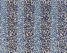 a blue and white pattern on fabric