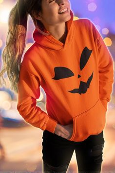 "⚝Pumpkin Kitty Face Halloween Hoodie. Spooky Season's finest pumpkin / Jack-o-lantern hoodie for Cat Lovers. ⚝ 💟Product Details: ❥Handmade design ❥Breathable Comfort. ❥ Relaxed fit ( Unisex ) ❥ Fabric: 50% Cotton + 50% Polyester ( front kangaroo pocket + drawstring on hood) ❥Care Instruction: Machine wash cold with similar colors, do not bleach, tumble dry low, do not iron, do not dry clean. ❥ Average Production Time: 7 business days before shipment 💟Shipping: It takes 7 days to create the pr Spooky Hooded Sweatshirt For Fall, Halloween Long Sleeve Sweatshirt With Drawstring Hood, Halloween Hooded Spooky Sweatshirt, Halloween Hoodie With Drawstring Hood, Spooky Hooded Halloween Sweatshirt, Hooded Halloween Hoodie With Drawstring, Hooded Spooky Halloween Sweatshirt, Spooky Long Sleeve Halloween Hoodie, Hooded Hoodie With Drawstring For Halloween