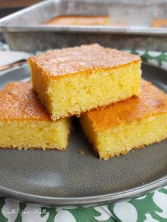 three pieces of cornbread on a plate