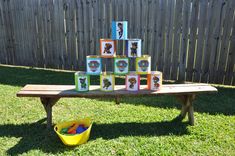 a wooden table topped with lots of cups