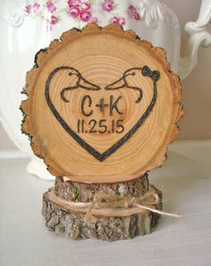 a wooden slice with a heart on it