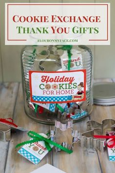 cookie exchange thank you gifts in a mason jar with holiday cookies for home tags on them