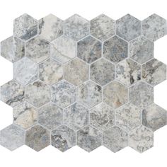 a white and grey hexagonal marble tile with gray veining on the edges