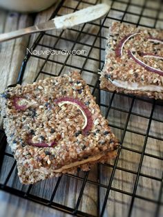 two squares of food sitting on top of a cooling rack