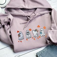 spooky season,Halloween Sweatshirt,Spooky Season,halloween shirt,embroidered,halloween sweatshirt,embroidered sweater,halloween,Halloween Embroidery,halloween gift,pumpkin sweatshirt,Halloween Crewneck,oversized sweatshirt,embroidery,trendy,Halloween University,Ghost Crewneck,fall sweater,Funny Halloween,gifts for her The fabric of the clothing is made up of 80% cotton and 20% polyester, and it is available in 23 different colors. Important Notes: The price listed is for one sweatshirt/hoodie/t- Halloween Embroidery Hoodies, Halloween University, Ghost Crewneck, Ghost Reading Book, Embroidered Ghost, Halloween Sweaters, Embroidery Halloween, Embroidered Halloween, Ghost Reading