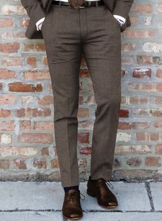 Experience the difference with our Hardy Minnis Dark Brown Twill Wool Pants. Impeccably tailored from the finest wool, the lustrous brown shade exudes dignified charm, further enhanced by the intricate twill weave that adds depth and texture to its appearance. Perfectly suited for high-stakes business meetings and prestigious social gatherings, it accentuates your stature, with every seam carefully placed to harmonize with your physique.   The "Enterprise" collection by Hardy Minnis, crafted from Huddersfield's rich textile heritage, offers luxurious Super 100s fabric weighing 210gsm. Ideal for suits and formal wear, this collection combines traditional and modern designs, ensuring smooth handling and year-round wearability. Elevate your style with the sophistication and quality of the "En Brown Shade, High Stakes, Twill Weave, Brown Shades, Wool Pants, Wool Suit, Suit Shop, Double Breasted Suit, Fabric Samples