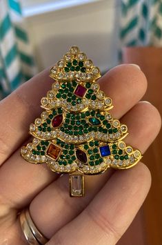 Gorgeous jewel-toned SIGNED Swarovski Christmas tree brooch, all stones intact. I'm good vintage condition. Happy to send video or more photos, will be shipped in a box to protect this rare find! Christmas Jewerly, Swarovski Christmas Tree, Swarovski Christmas, Im Awesome, Jewel Tones, In A Box, More Photos, Brooch Pin, Brooches