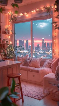 a living room filled with furniture next to a window covered in lights and greenery