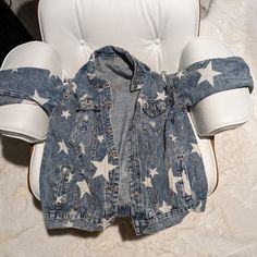 Star Print, Washed, Frayed Jean Jacket For All Seasons. Brand New. Button Up, Slightly Oversized, Long Sleeve With Barrel Cuffs. Casual Oversized Outerwear With Star Print, Trendy Long Sleeve Outerwear With Star Print, Denim Jacket With Star Print And Long Sleeves, Denim Jacket With Star Print, Long Sleeve Denim Jacket With Star Print, Casual Outerwear With Star Print For Spring, Casual Spring Outerwear With Star Print, Winter Denim Outerwear With Star Print, Casual Winter Denim Jacket With Star Print