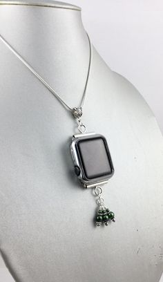 38mm - 40mm - 41mm Apple iWatch Necklace with  silverplate  chain and glass beads . The chain is 30 inches in length and connects with a lobster claw. The necklace also includes the 38mm - 40mm - 41mm iWatch connectors and Glass  beads. This makes a great option to wear your iWatch as a necklace and can then can be easily transitioned back to wearing with your watch band . Please send us a message if you have any questions . Silver Necklace With Extender As Gift, Silver Necklace With Extender, Silver Beaded Chain Necklace In Stainless Steel, Silver Stainless Steel Necklaces With Beaded Chain, Silver Stainless Steel Jewelry With Beaded Chain, Silver Stainless Steel Necklace With Beaded Chain, Silver Jewelry With Ball Chain For Gift, Silver Jewelry With Round Pendant And Ball Chain, Nickel-free Green Stainless Steel Jewelry