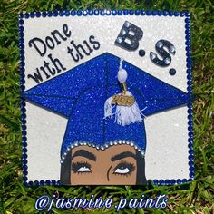 a blue and white graduation cap with the words b's done with this on it