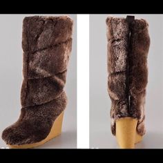 Brand New Never Worn Tory Burch Fur Wedged Boot In Brown. These Shearling Wedge Boots Feature Patent Leather Trim And A Pull Tab. Crepe-Covered Platform And Wedge Heel. Rubber Sole. No Defects! 1000% Authentic. Great Fashion Boots, Comfortable With The Wedge Heel, Like Upgraded Uggs. Come Up To Mid Calf."* Heel: 4 (100 Mm). * Platform: 1 (25 Mm). * Shaft: 11" (28 Cm). * Circumference: 13" (33 Cm). * Fur: Dyed Sheep From Australia. Style #Toryb40236 No Box Retail $395 Australia Style, Boots Comfortable, Great Fashion, Wedge Boots, Tory Burch Shoes, Pull Tab, Shoes Heels Boots, Leather Trim, Shoe Brands