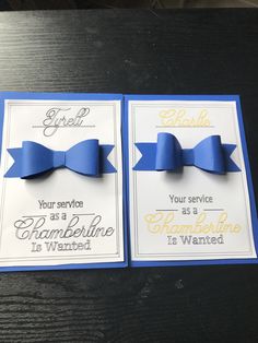 two greeting cards with blue bows on them