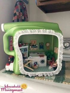 a green and white microwave oven sitting on top of a counter next to a washing machine