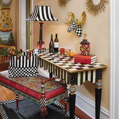 a checkered table topped with lots of bottles and lamps