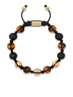 dark brown tiger eye/onyx/cubic zirconia adjustable fit gold-tone hardware knot detailing engraved logo Nialaya Jewelry is pleased to offer free repairs on purchases for one year from purchase date. Luxury Adjustable Beaded Bracelets With Round Beads, Luxury Adjustable Gemstone Beaded Bracelets, Luxury Brown Adjustable Bracelet, Luxury Adjustable Brown Bracelet, Luxury Adjustable Hand-strung Bracelets, Adjustable Gold Beaded Bracelets With Stones, Luxury Beaded Yellow Gold Bracelets, Luxury Yellow Gold Bracelets With Stones, Luxury Adjustable Jewelry With Natural Stones