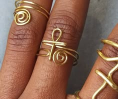 One size fits most. Arrives adjusted to fit a size 7 Adjustable - This ring is very bendable and easy to adjust. Message me if you need a bigger or smaller size. Can be worn as a top finger ring or toe ring as well. Made with 20 gauge brass wire. Each ring is handmade to order. Ankh Ring, Nose Ring Jewelry, Dope Jewelry Accessories, Wire Jewelry Rings, Wire Wrap Jewelry Designs, Wire Wrapped Jewelry Diy, Bijoux Fil Aluminium, Earthy Jewelry, Wire Jewelry Designs