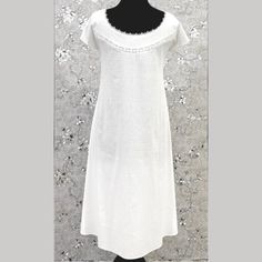 This Charming Vintage Victorian Nightgown Is Crafted From 100% White Cotton, Offering Both Comfort And A Touch Of Classic Elegance. Featuring Short Sleeves, It Blends Historical Style With Modern Convenience. The Soft, Breathable Fabric Is Perfect For A Restful Night’s Sleep, While Delicate Victorian Details Such As Lace Trims Or Embroidered Accents Add A Timeless Touch To Elegant Summer Dresses For Relaxation, White Lace Trim Sleepwear For Relaxation, Elegant Summer Nightgown For Bedtime, Elegant Spring Dresses For Relaxation, Elegant Short Sleeve Nightgown For Loungewear, Elegant Short Sleeve Nightgown For Bedtime, Elegant Short Sleeve Nightgown, Elegant Short Sleeve Sleepwear With Lace Trim, Feminine Fitted Sleepwear