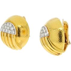 Behold the exquisite craftsmanship and undeniable allure of these David Webb Platinum & 18K Yellow Gold Diamond Dome Round Clip On Earrings. These captivating pieces are meticulously crafted with a blend of 18K yellow gold and platinum, showcasing a harmonious fusion of elegance and durability. The brilliance of the round cut diamonds accentuates the beauty of these earrings, reflecting light with every graceful movement.What sets these earrings apart is the signature David Webb hammered finish, Luxury Concave Dome Ring In Yellow Gold, Luxury Gold Domed Jewelry, Luxury Domed Cabochon Dome Ring, David Webb Earrings, David Webb Coral Earrings, Yellow Rings, David Webb, Yellow Jewelry, Diamond Birthstone