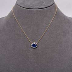 This is part of Chairish’s Fine Jewelry assortment.  If you are looking for a little bit of color to make you happy, this is your necklace. A perfect size sapphire for every day that you won't want to take off. We like to layer ours with the sapphire crescent pendant of the oval link chain with diamond connector clasp.  14K Gold; .08 CT Diamonds; 3.23 CT Sapphires; 16 - 18 inches Sapphire Gemstone Pendant Diamond Necklace, Sapphire Gemstone Diamond Pendant Necklace, Sapphire Diamond Gemstone Pendant Necklace, Sapphire Diamond Necklace With Gemstone Accents, Gold Necklaces With Sapphire And Gemstone Accents, Sapphire Diamond Pendant Necklace, Sapphire Oval Pendant Necklace In Fine Jewelry Style, Fine Jewelry Sapphire Necklace With Oval Pendant, Sapphire Pendant Necklace With Gemstone Accents