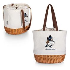 two baskets with mickey mouse on them, one is white and the other has brown handles