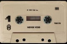 an old white cassette recorder with the words never void on it