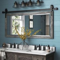 Just right for adding country farmhouse style to your space, this rectangular mirror combines a bold mix of materials we love. It's made from engineered wood (MDF) and features a metal frame up top for a barn door-style look that's charming and rustic. The medium gray tone of the frame takes the style a bit further and gives the attractive look of old barn wood, while the aged, weathered vibes lean into its vintage-inspired charm. Laurel Foundry Ranch Interior, Barnwood Wall, Interior Remodel, Wall Accent, Farmhouse House, Accent Mirror, Kew Gardens, Rustic Bathroom, Bathroom Designs