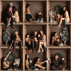 a group of people sitting on top of wooden boxes filled with christmas trees and presents