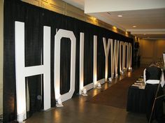 a black and white sign that says hollywood on it