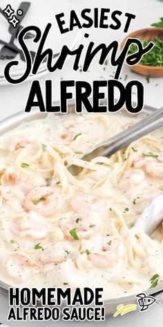 shrimp alfredo in a skillet with a serving spoon