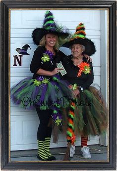 two women dressed up in halloween costumes