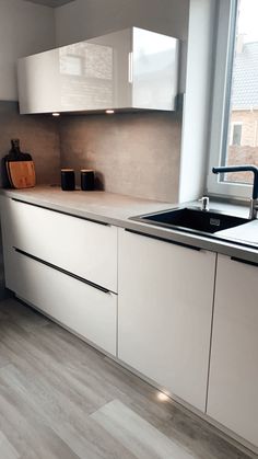 the kitchen is clean and ready for us to use in its new owner's home