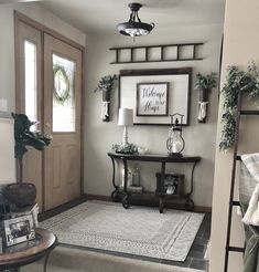 a living room filled with furniture and decor on top of carpeted flooring next to a doorway