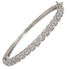 .90ct natural diamonds bangle bracelet Squared rope twist form surrounding each diamond Rounds & Full cut. H-color & Si-1 clarity. 14kt. white gold 11 Grams. 4.6mm wide 6.5 inch (wearable length) Secure Lock, safety catch and snap White Rope, Rope Twist, Diamond Bangles Bracelet, Diamond Bangle, Bangle Bracelet, Diamond Bracelet, Natural Diamonds, Bangle Bracelets, Jewelry Bracelets