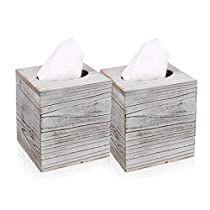 two wooden boxes with tissue paper on them