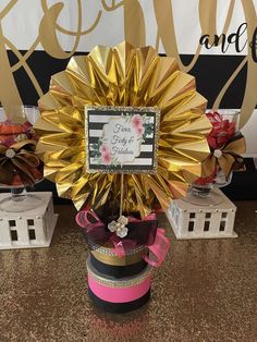 a table topped with lots of different types of ribbons and flowers on top of each other