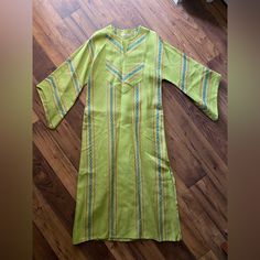 1960s Lime Green Cotton Kaftan Handwoven By Blind Women. Stunning And In Great Condition. Men’s Women’s Ceremonial Hippie Boho Dress Pit: 20 In Waist: 21 In Hip: 22 In Length: 53 In Festive Green Kurta For Beach Occasions, Green Long Sleeve Kurta For The Beach, Spring Beach Green Kurta, Green Spring Beach Kurta, Green Handloom Long Sleeve Kurta, Green Long Sleeve Handloom Kurta, Traditional Green Kurta For Vacation, Green Handloom Kurta With Long Sleeves, Traditional Spring Vacation Kurta