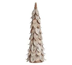 a tall white christmas tree with lights on it's sides and feathers hanging from the top