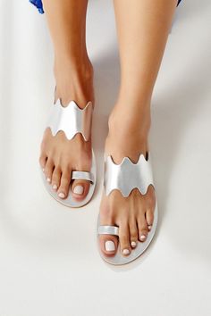 Find the most stylish slides & slingback sandals of our collection below: https://www.etsy.com/shop/GreekChicHandmades?ref=seller-platform-mcnav&section_id=26050675 The classic Greek leather toe ring sandals re-imagined and re-designed. We kept the minimal aesthetic but we modernized the feel. Handmade of top quality leather in silver, the Sikinos summer shoes feature our signature wavy thick strap that has an elastic part on its inner side in order to offer perfect fit and support on an Adjustable Toe Ring Sandals For Summer, Silver Open Toe Barefoot Sandals For Summer, Summer Silver Open Toe Barefoot Sandals, Modern Silver Open Toe Slingback Sandals, Silver Open Toe Sandals For Vacation, Vacation Silver Open Toe Sandals, Silver Toe Loop Sandals For Summer, Silver Flat Sandals For Vacation, Silver Open Toe Flip Flops For Beach