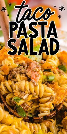 taco pasta salad on a plate with the words taco pasta in front of it