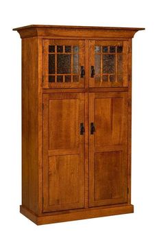 Add mission-style charm to your old world kitchen with the Amish Norway Mission 4-Door Pantry. This exquisite pantry cabinet is crafted from solid wood with mullion-detailed glass panels, offering plain or seedy glass for a vintage touch. LED or canister lights illuminate adjustable shelves, drawers, or roll-out trays, perfect for organizing linens, utensils, or pantry staples. A beautiful addition to your apothecary kitchen or mission furniture collection, made in America!