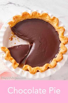 a chocolate pie with a slice missing from it