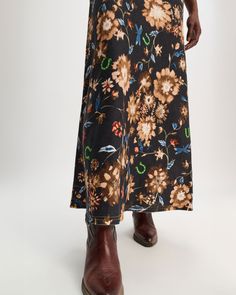 The Printed Linen Skirt with Removable Leather Tie Belt in Dark Mix by Dorothee Schumacher is a bias cut, maxi skirt crafted an all over print with a frayed waistband and hemline. Removable leather tie belt 100% Linen, The outer linen fabric has been certified with the EUROPEAN FLAX® label, which proves traceability at every step of linen processing. #658905 Outer Linen, Ladylike Dress, Bias Cut Skirt, Leather Tie, Custom Label, Linen Skirt, Straight Leg Denim, Accessories Clothing, Denim Flares